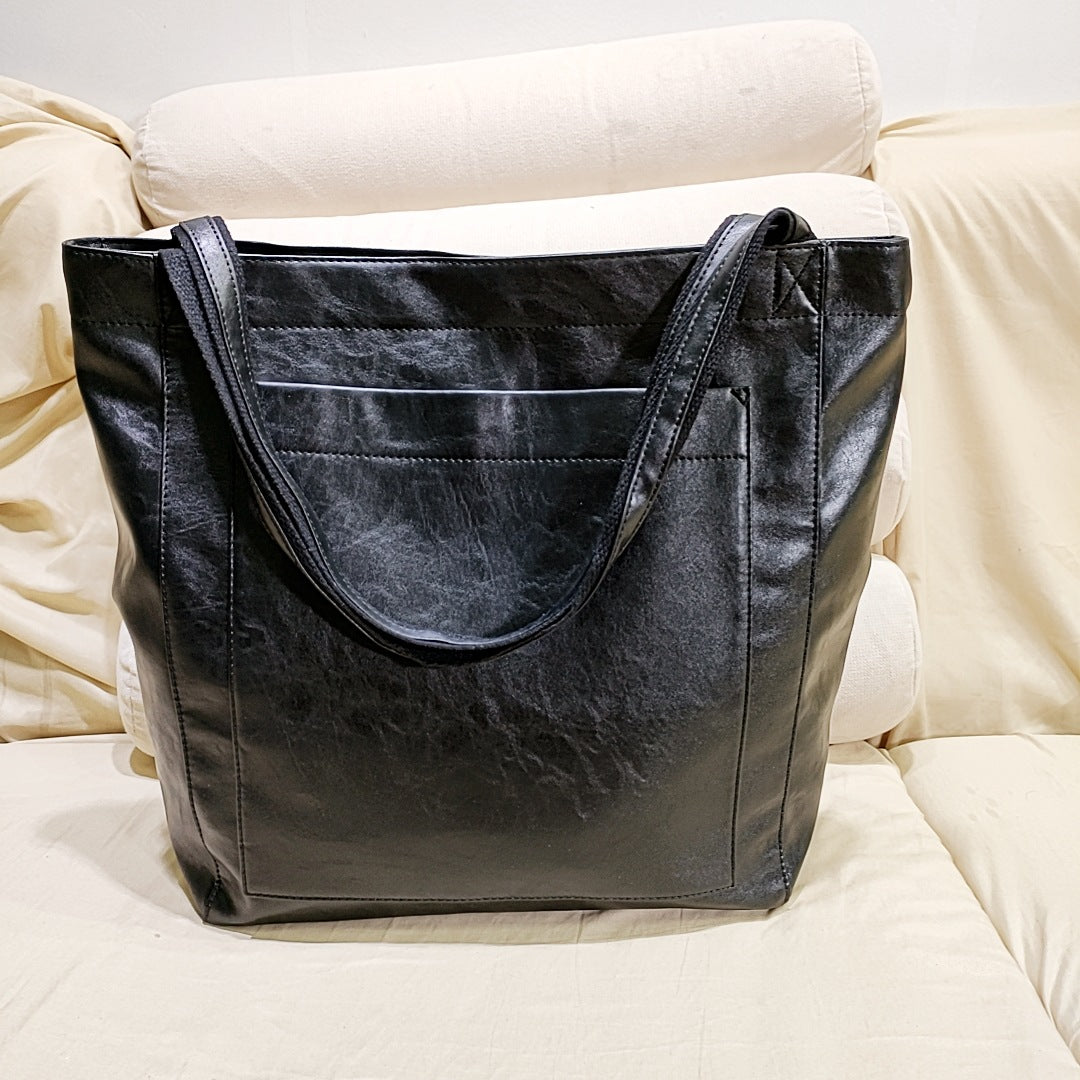 Elegante Handtasche für Damen aus weichem Leder schwarz vielseitig und stilvoll 2