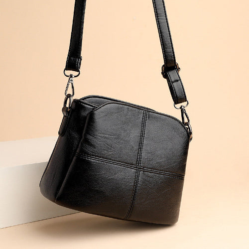 Elegante Umhängetasche für Damen kompakt aus PU-Leder leicht kombinierbar 1
